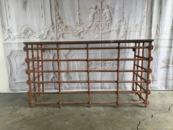 Rustic Console Table with Textured Stone Top and Hand-Forged Iron Base