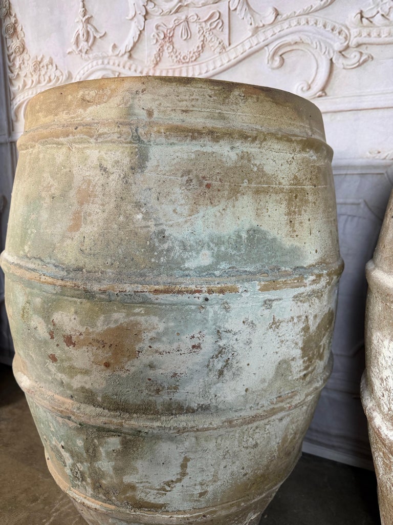 Pair of Antique Mediterranean Terracotta Storage Jars with Weathered Patina