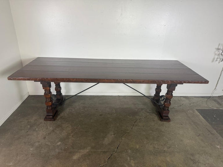 Monumental Spanish Revival Style Walnut Trestle Dining Table with Hand-Hewn Top