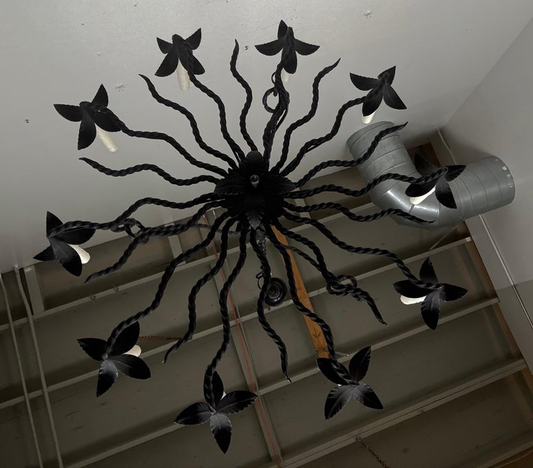 Spanish Revival Wrought Iron Twelve-Light Chandelier, circa 1930
