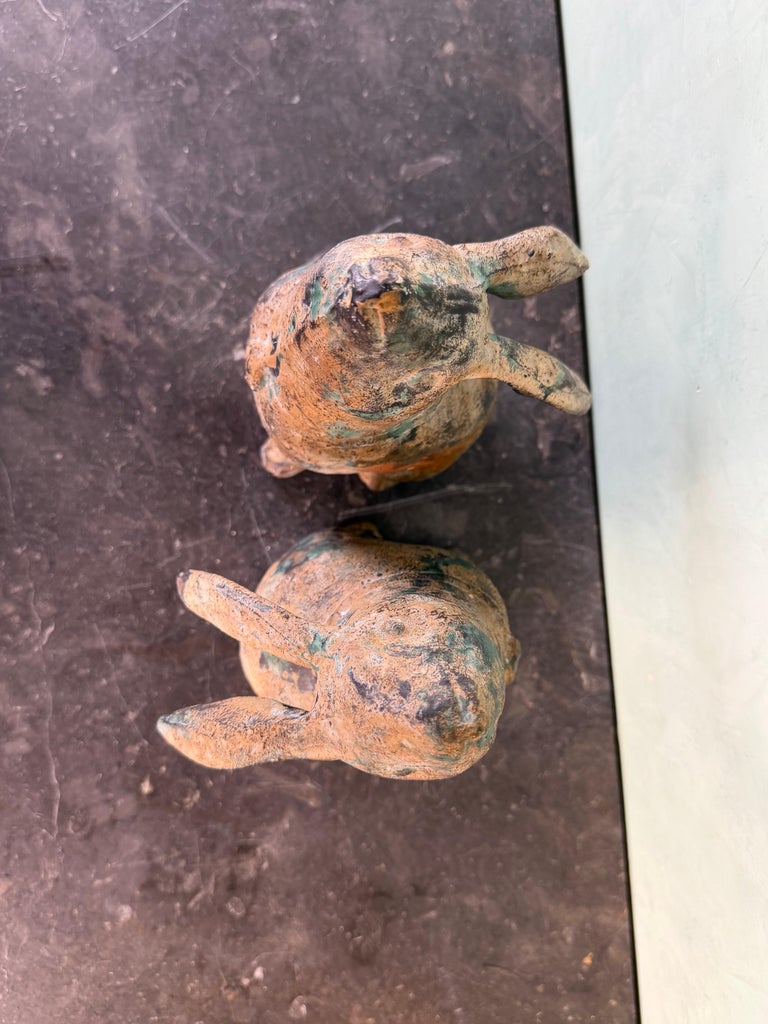 Pair of Weathered Cast Iron Rabbit Garden Sculptures with Verdigris Patina