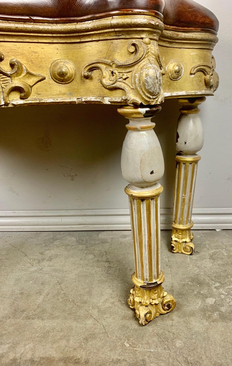 Italian Painted and Parcel Gilt Leather Bench