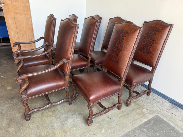 Set of Eight Spanish Revival Leather and Carved Walnut Dining Chairs