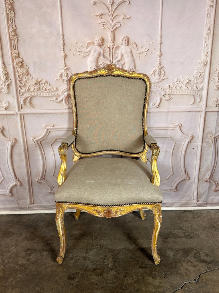 Set of 14 French Louis XV Style Gilt Dining Chairs with Linen Upholstery