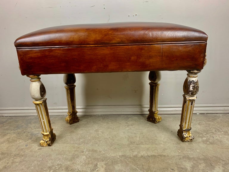 Italian Painted and Parcel Gilt Leather Bench