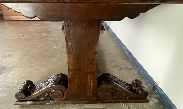Monumental Spanish Revival Carved Trestle Dining Table, Early 20th Century