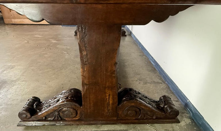 Monumental Spanish Revival Carved Trestle Dining Table, Early 20th Century