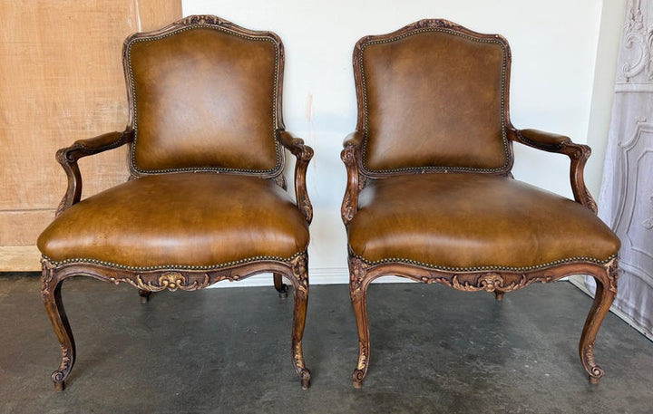 Pair of VIntage French Louis XV Cognac Leather Fauteuils