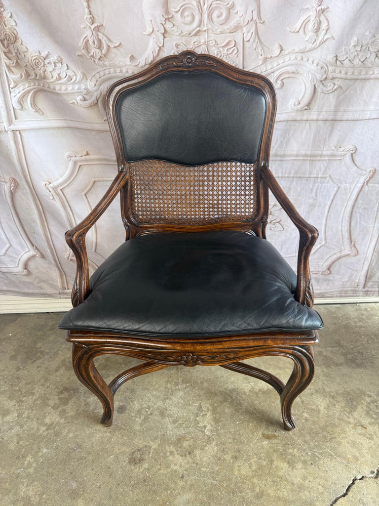 Eight French Provincial-style dining chairs