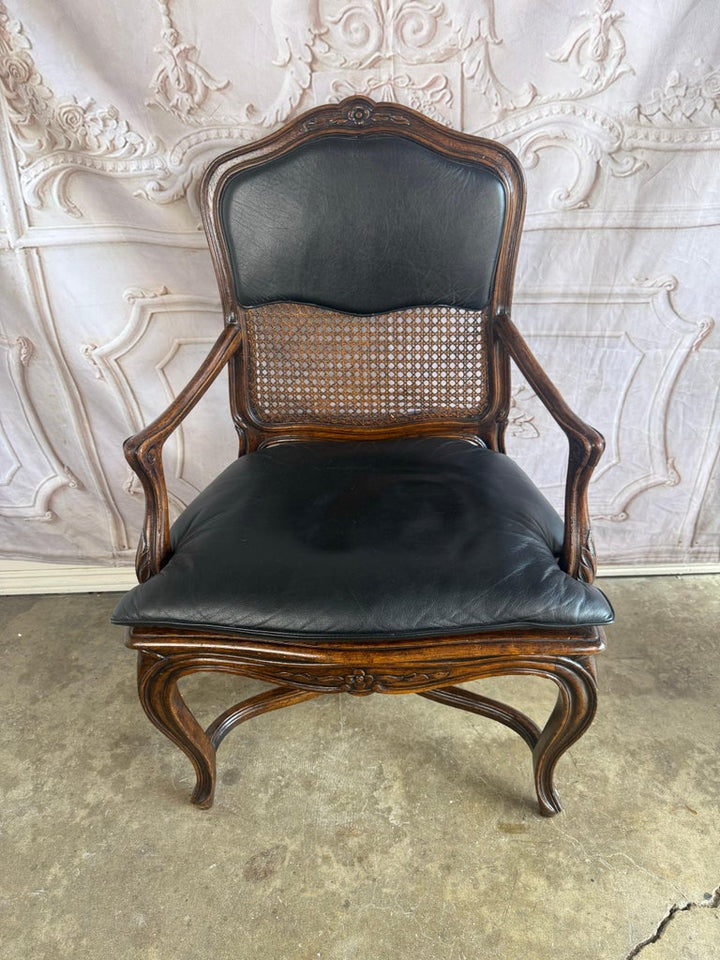 Eight French Provincial-style dining chairs