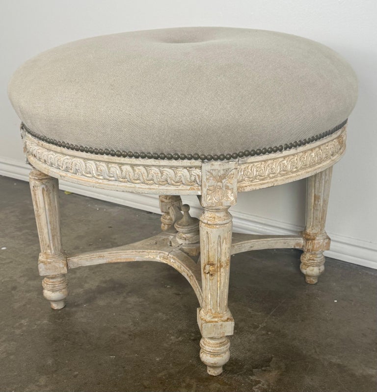 French Neoclassical upholstered ottoman, early 20th century.
