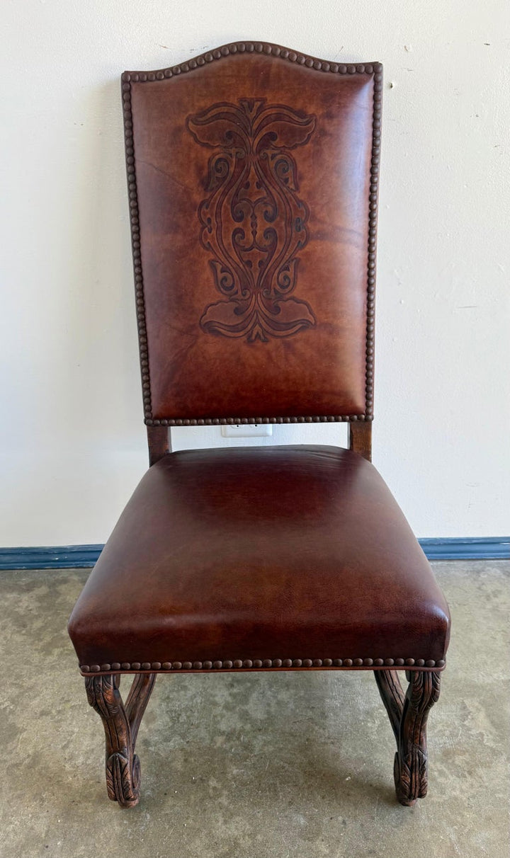 Set of Eight Spanish Revival Leather and Carved Walnut Dining Chairs