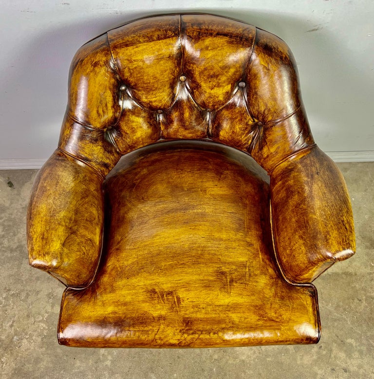 Pair of Mid-Century Leather Tufted Armchairs on Swivels