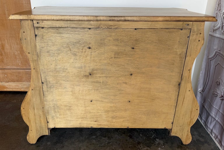 A Sculptural Dutch Bombe Commode in Bleached Maple
