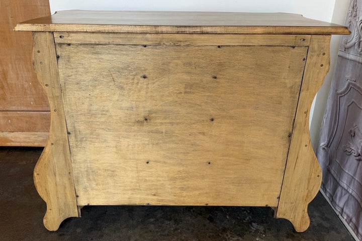 A Sculptural Dutch Bombe Commode in Bleached Maple