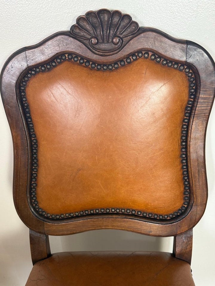Set of Eight French Carved Wood Dining Chairs with Leather Upholstery