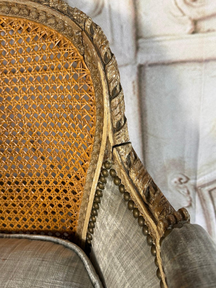 Antique French Louis XVI Style Painted Bergère Chair with Cane Back