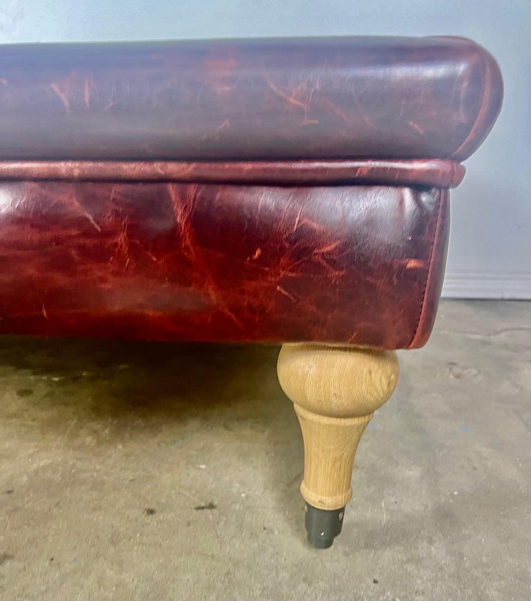 English Leather Tufted Ottoman on Casters