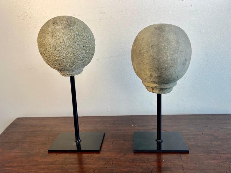 Pair of Mounted Spheres on Iron Bases