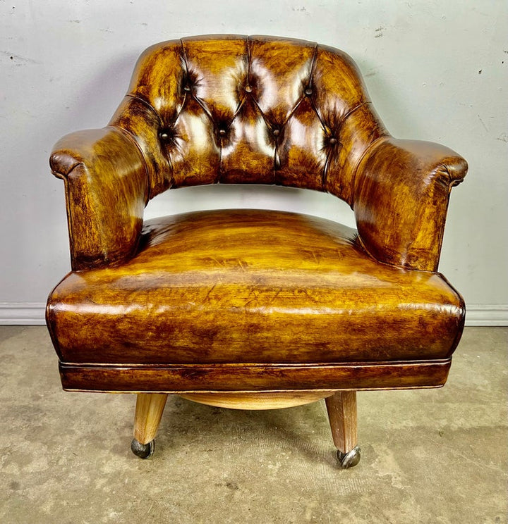 Pair of Mid-Century Leather Tufted Armchairs on Swivels