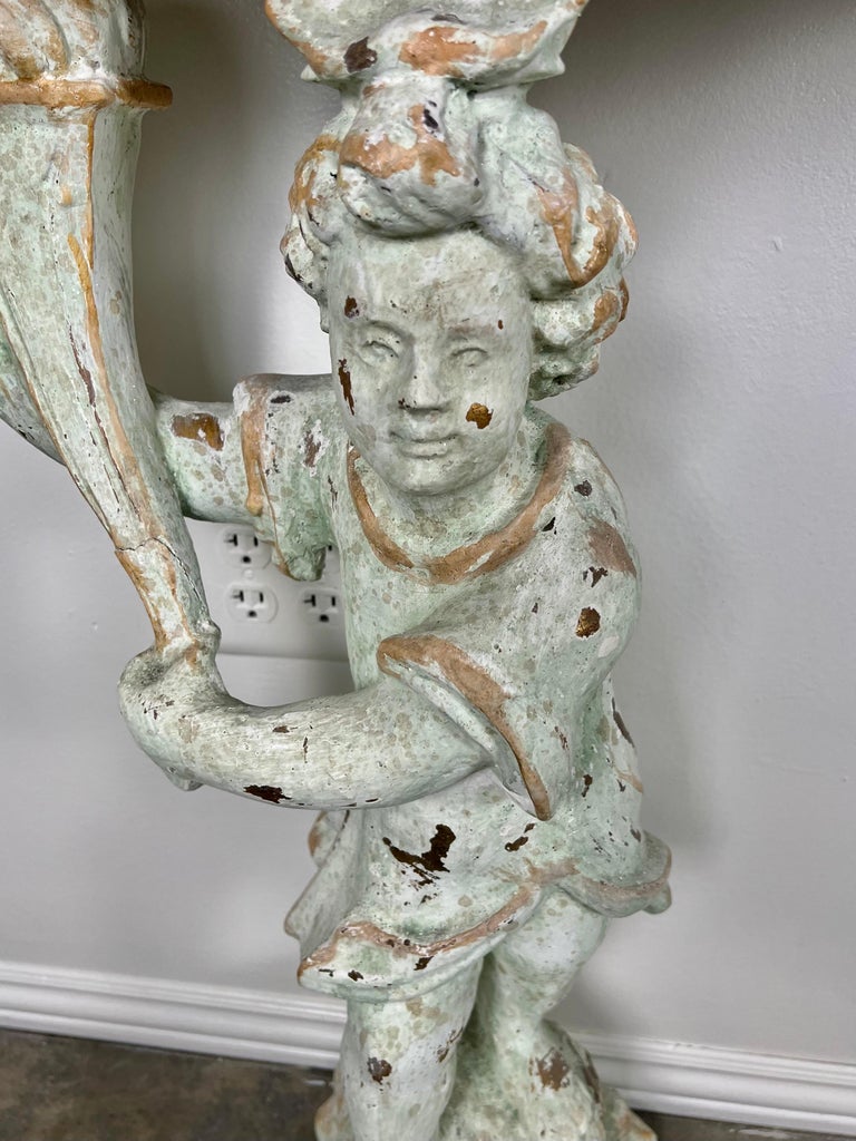 Pair of Cherub Consoles with Marble Tops, circa 1930s