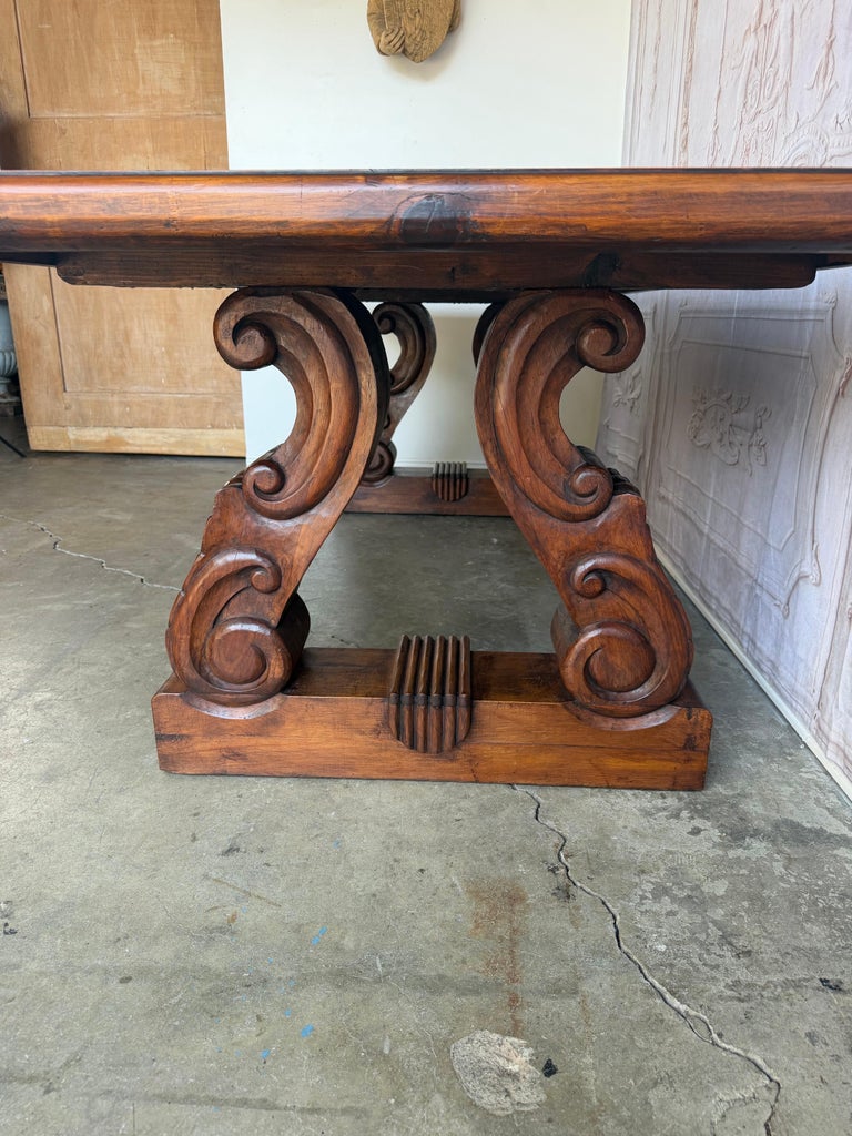 Spanish Colonial Revival Walnut Dining Table with Hand-Carved Scrollo