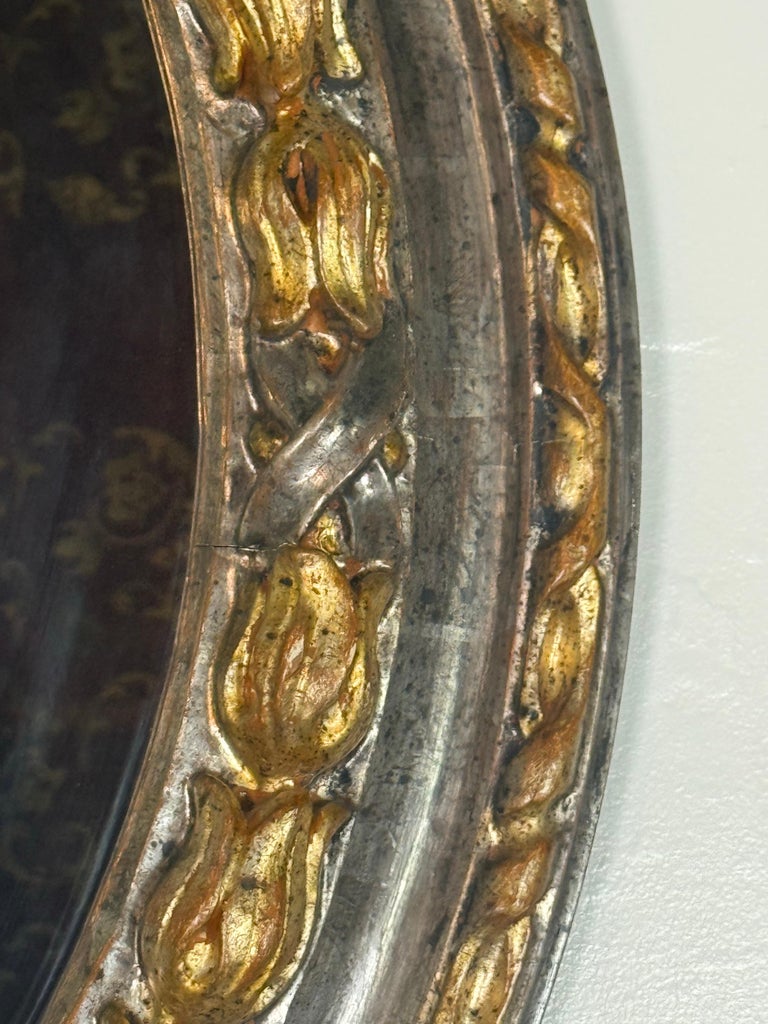 19th Century Italian Oval Mirror in Burnished Silver Leaf and Gold