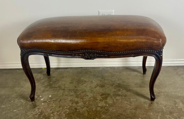 French Louis XV Style Carved Bench with Distressed Leather Upholstery