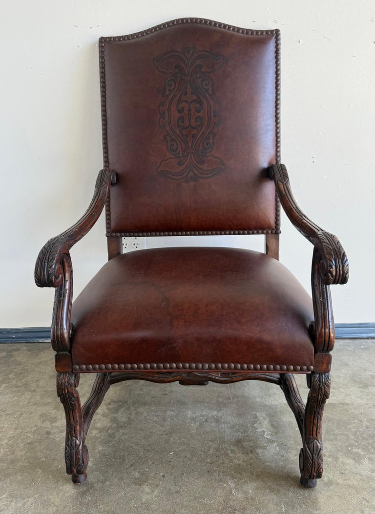 Set of Eight Spanish Revival Leather and Carved Walnut Dining Chairs