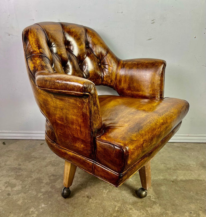 Pair of Mid-Century Leather Tufted Armchairs on Swivels