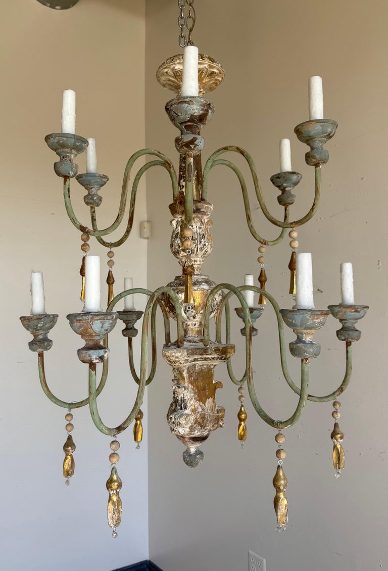 Grand Italian Painted and Giltwood Twelve-Light Chandelier