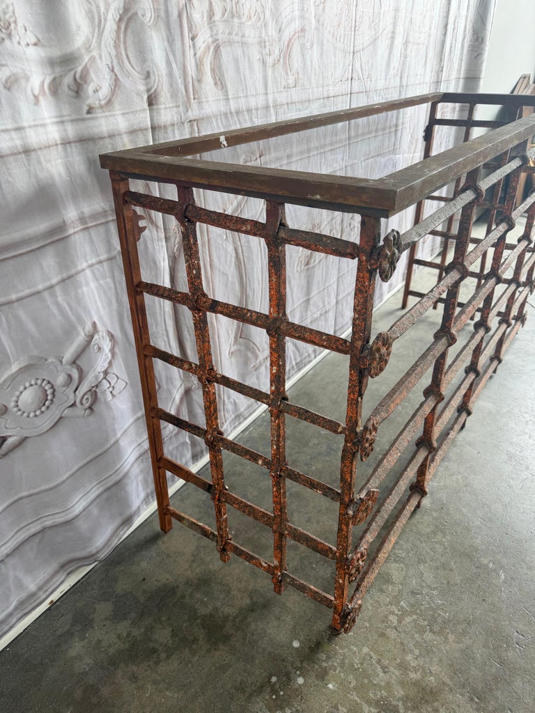 Rustic Console Table with Textured Stone Top and Hand-Forged Iron Base