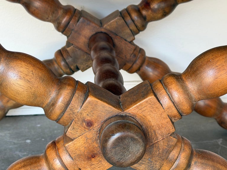 Pair of Spanish Colonial Baroque Bobbin - X-Base Stools with Distressed Leather