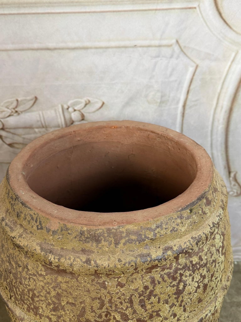 Ribbed Terracotta Storage Vessel with Ochre Encrusted Patina