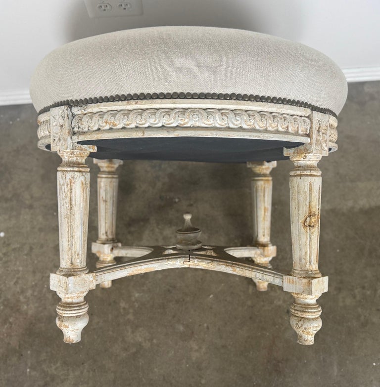 French Neoclassical upholstered ottoman, early 20th century.