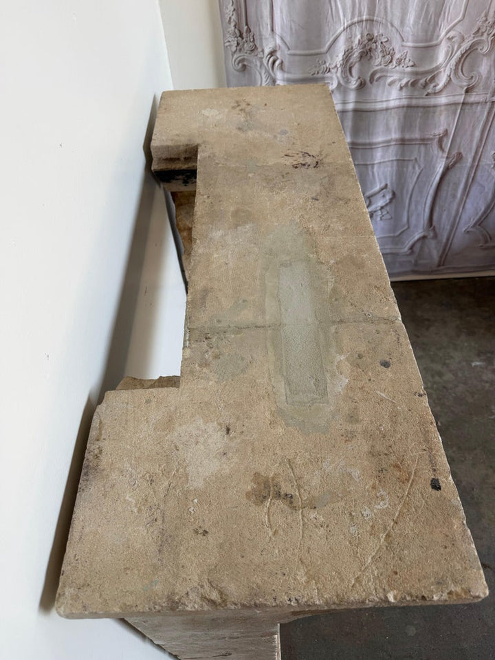 Petite 18th Century French Limestone Fireplace Mantel With Scrolled Corbels