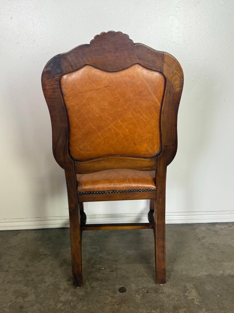 Set of Eight French Carved Wood Dining Chairs with Leather Upholstery