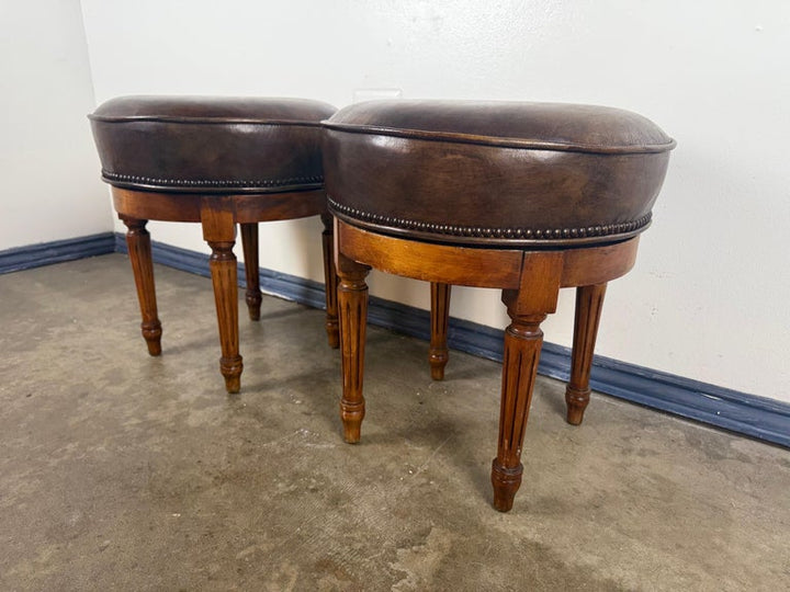 Pair of Louis XVI–Style Swivel Stools in Patinated Leather, Mid-20th Century