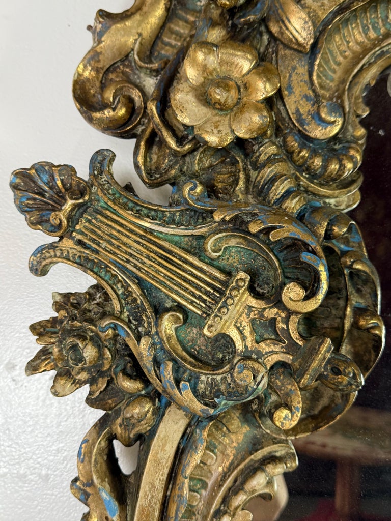 19th Century Italian Rococo Giltwood Figural Mirror