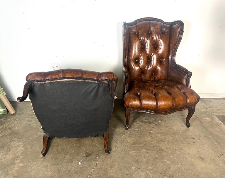 Pair of French Leather Tufted Wingback Chairs C. 1930