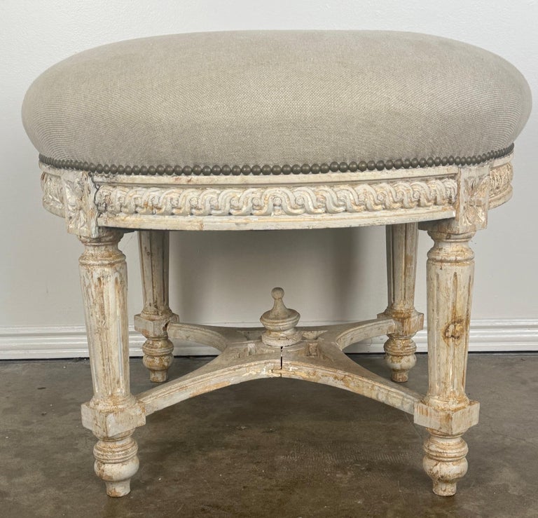 French Neoclassical upholstered ottoman, early 20th century.