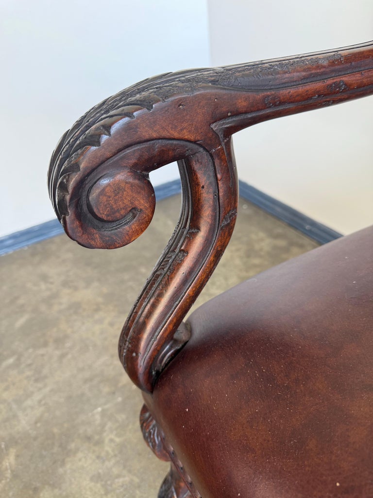 Set of Eight Spanish Revival Leather and Carved Walnut Dining Chairs