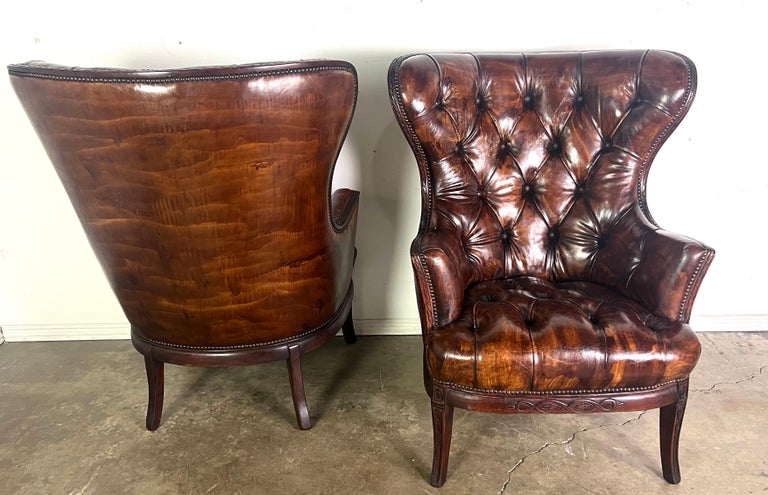 Pair of 19th Century English Leather Tufted Armchairs