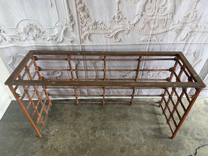 Rustic Console Table with Textured Stone Top and Hand-Forged Iron Base