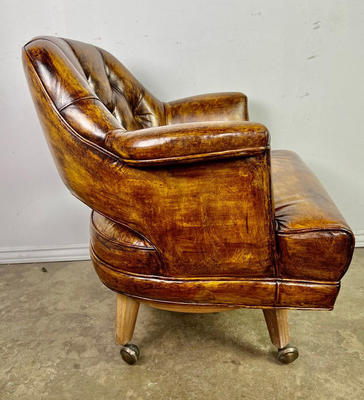 Pair of Mid-Century Leather Tufted Armchairs on Swivels