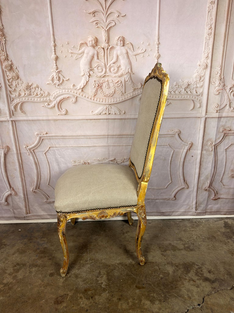 Set of 14 French Louis XV Style Gilt Dining Chairs with Linen Upholstery