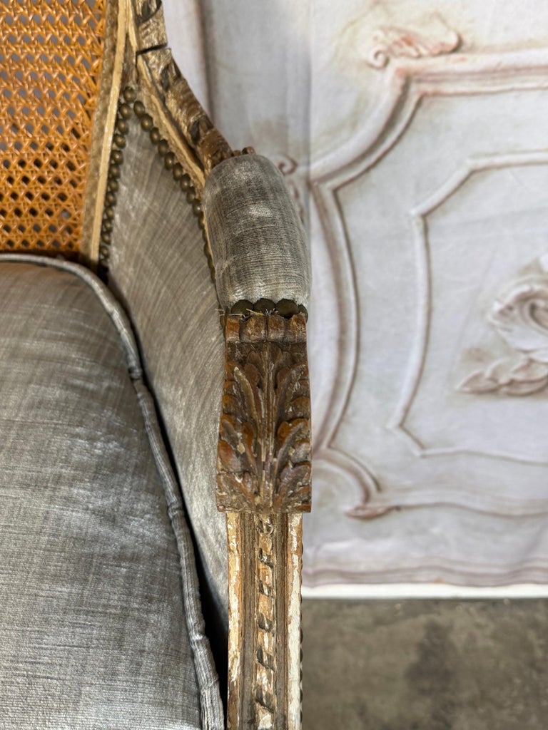 Antique French Louis XVI Style Painted Bergère Chair with Cane Back