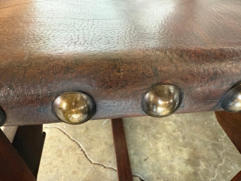 Set of Ten Spanish Revival Leather Dining Chairs, circa 1920s