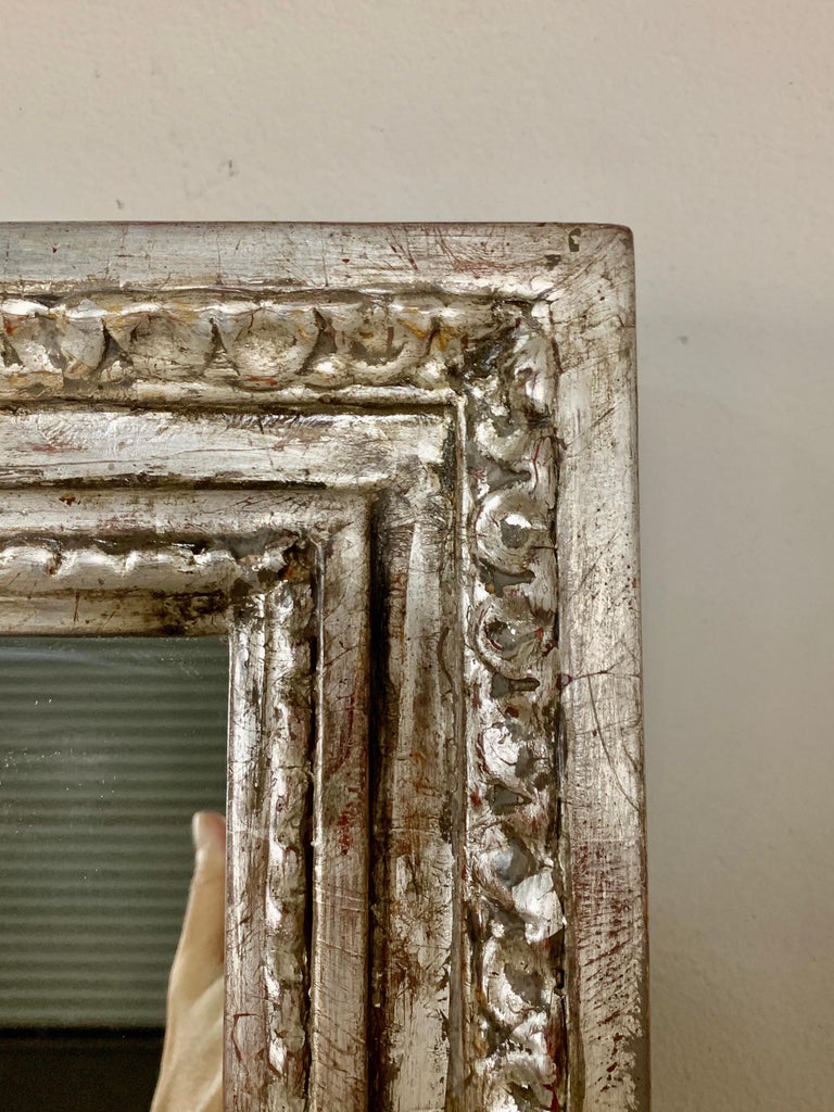 Pair of Silvered Hand Carved Mirrors by MLA