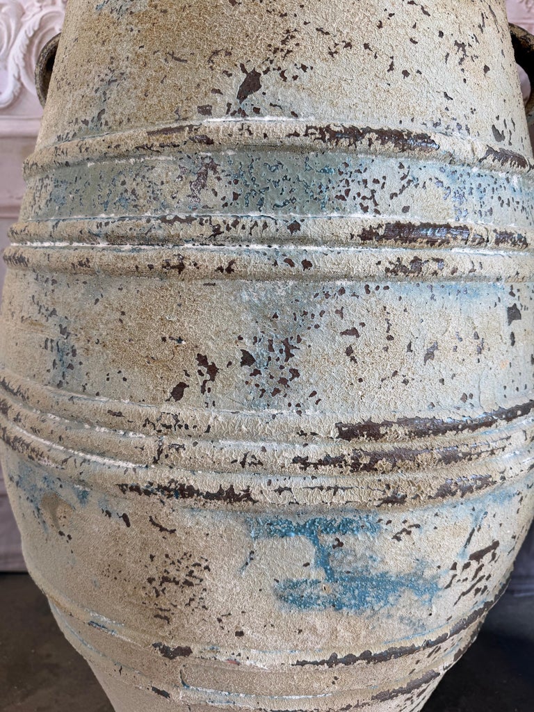 Pair of Large Distressed Mediterranean Style Terracotta Olive Jars with Handles